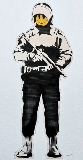 Banksy - Smiling Copper 111/150 - číslovaná edice s certifikátem, 50x70cm